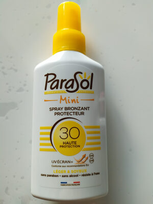 Parasol spray bronzant protecteur